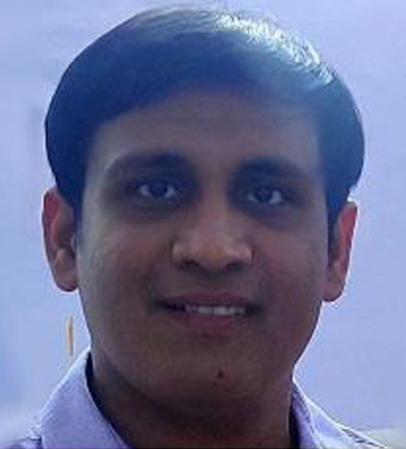 Dr. Tarunesh Sharma